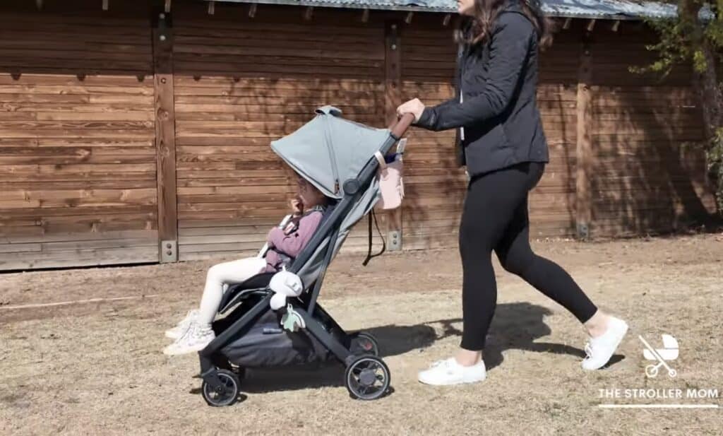 Minu with toddler and push