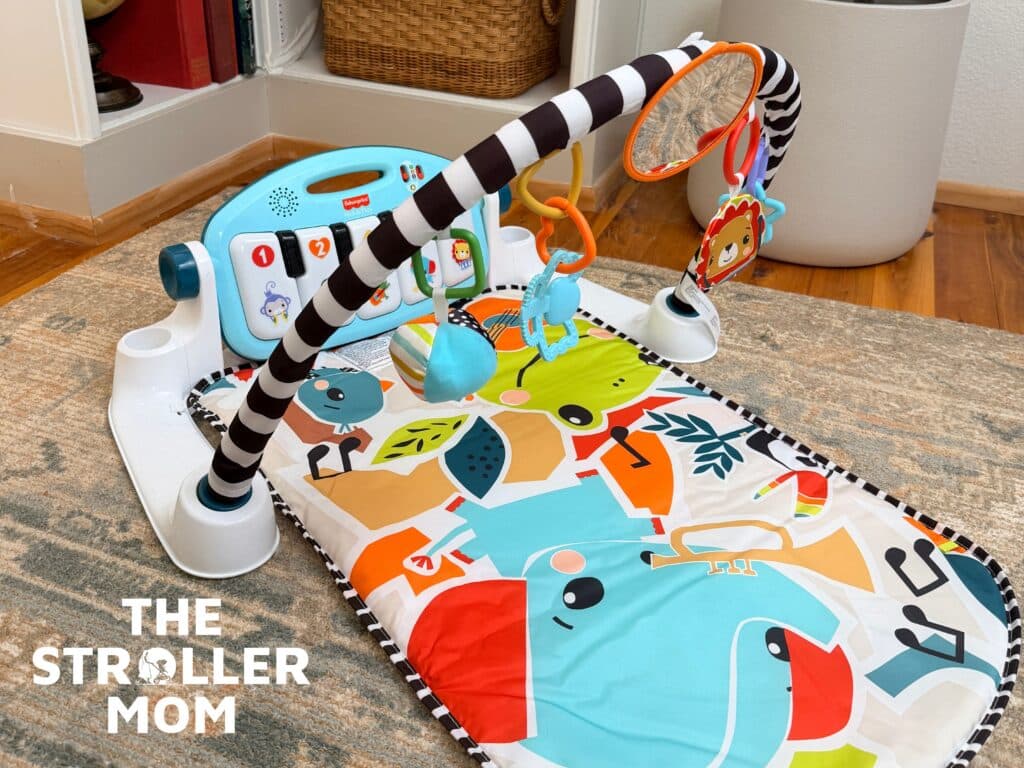 Fisher-Price Glow and Grow play gym with kick piano