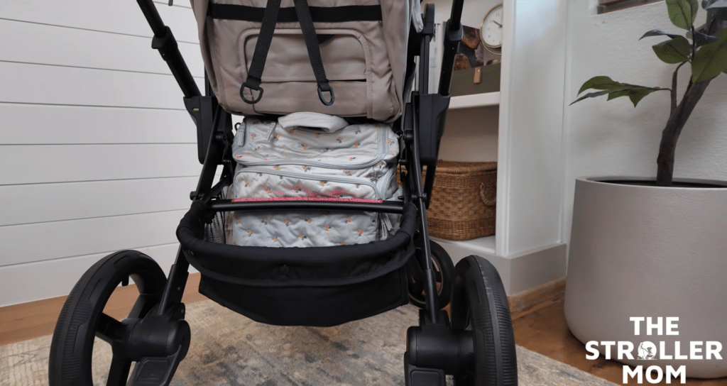Evenflo Transformer basket with Caraa diaper bag inside
