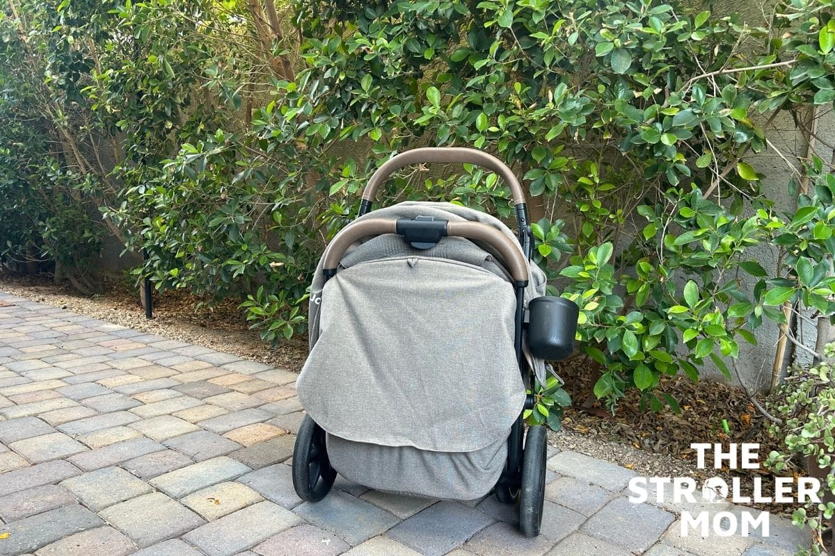 Rear view of the Joie Nutmeg stroller with its canopy closed