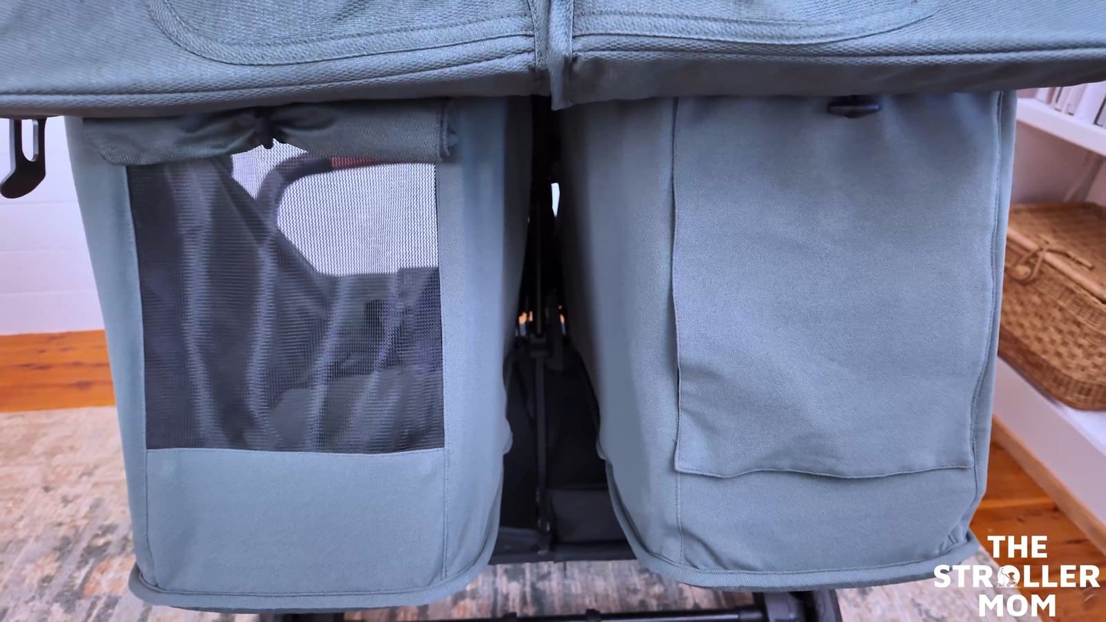 Zoe Twin V3 rear seat panels with one mesh ventilation flap open and the other closed.